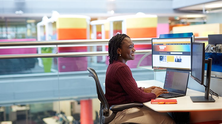 woman looking at a laptop