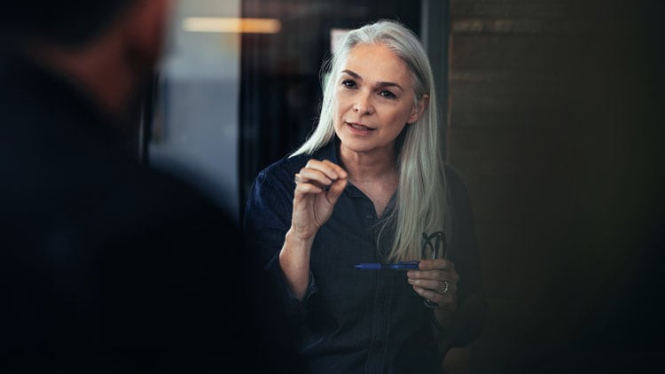 A woman talking to someone